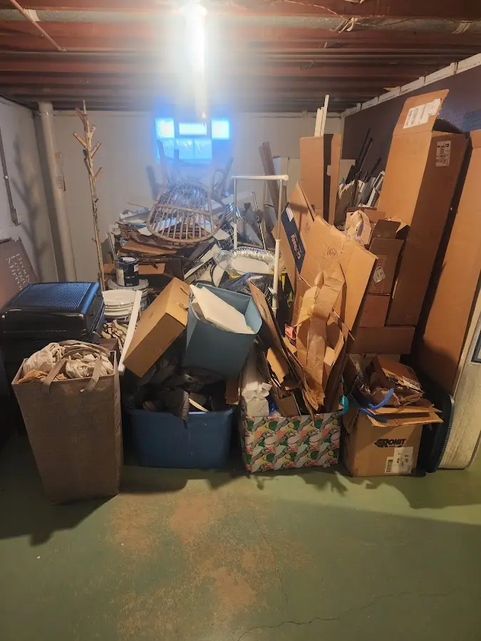 Roll-off dumpster container at job site for 4 Yard Dumpster Rental in Lowell